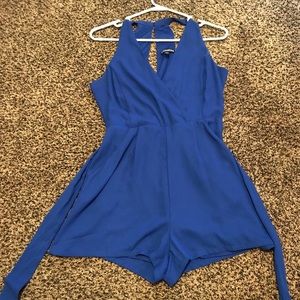 Blue Express romper that ties at waist